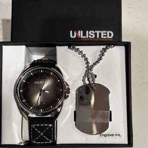 UNLISTED by Kenneth Cole. Black and Silver Timepiece with dog tag.